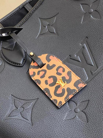 Louis Vuitton Neverfull MM Monogram Empreinte 31cm – product image 5